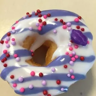 a frosted donut with sprinkles