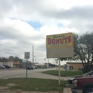 a sign for a donut shop