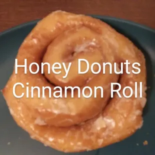 a cinnamon roll on a plate