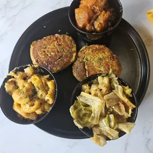 Salmon cake dinner with an extra side... yams, mac n cheese and cabbage
