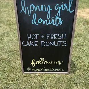 a sign for a donut shop