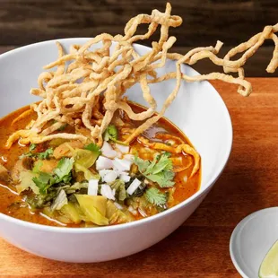 a bowl of soup with noodles