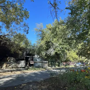 View from the road - there's a parking area to the right side of the road ( the empty field )