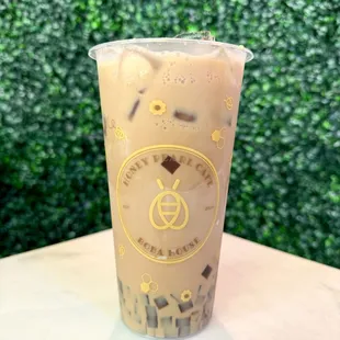 Honey Buzz - Thai coffee with organic raw honey and oat milk. Pairs well with coffee jelly as pictured!