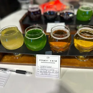 a flight of honey pots