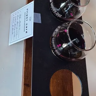 four glasses of wine on a tray
