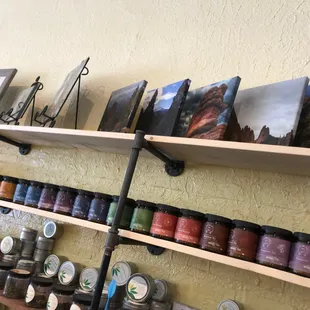 a shelf full of jars