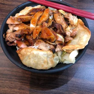 Gyoza bowl. Teriyaki chicken, gyoza, rice. So good!