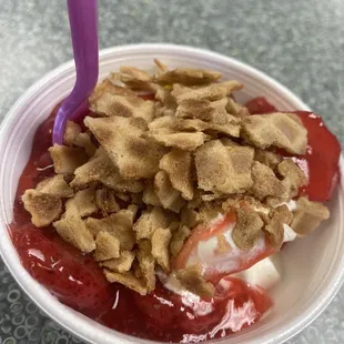 New York style cheesecake and graham cracker yogurt with strawberries and waffle crunchies