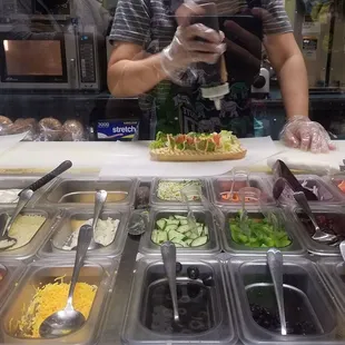 a woman making a salad
