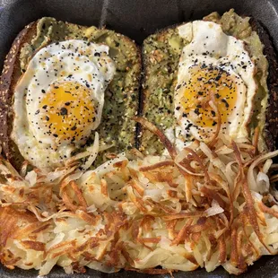 Avocado toast with sunny side up eggs