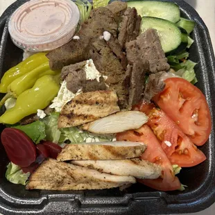Greek salad with half chicken half gyro meat