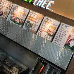 menus on the wall of a restaurant