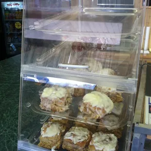 a display case of honey whip donuts