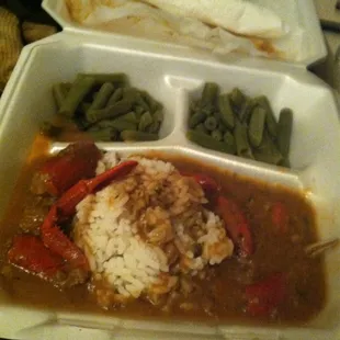 a meal in a styrofoam container