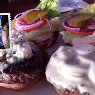 A blue burger and a white cheese with Jalapeno burger.