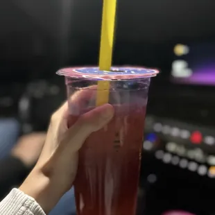 Dragonfruit Lemonade w/ ice, mango boba, mango and strawberry jelly.
