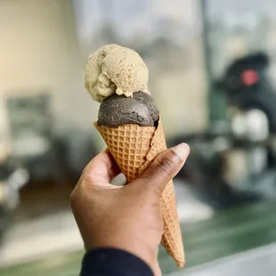 Sweet corn cone with 2 scoops (one darkest chocolate)