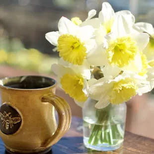 Fresh coffee and flowers