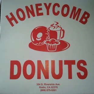 a sign for a donut shop