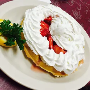 This waffle is just simply amazing. It's crispy and yet soft. The strawberries are fresh and the whip cream is just amazing.