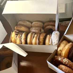 a variety of donuts in boxes