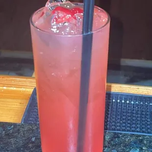 a drink with a straw in it