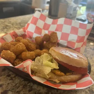 Burger and tots at double the price of menu.
