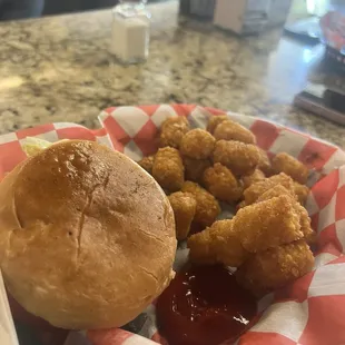 Burger and tots twice the price of the menu.