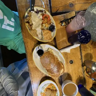 Country fried steak and fried fish with grits short stack