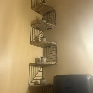 Cute little plant shelf.