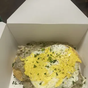 Turkey sausage biscuits and gravy with a very pretty egg to top off pure deliciousness