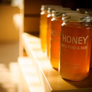 jars of honey on a shelf