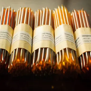 a close up of a bunch of honey sticks