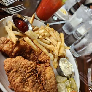Catfish dinner, double fries, pickles, homemade tarter sauce.