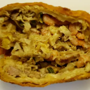 A peek into the good shrimp and pork egg roll, better than most.