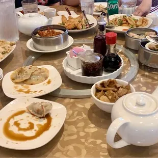 Pork and leek dumplings, deep fried tofu, pan fried dumplings, tripe in brown sauce, chicken feet