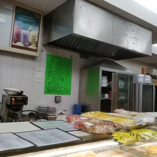 a counter with a variety of food items