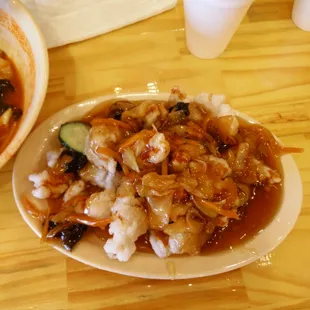the fried pork with sweet and sour sauce. You can also get it with sauce on side if you wanna keep your pork crisp