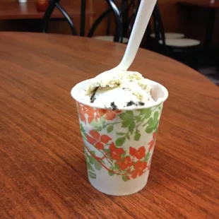 Just 50 cents! ( The cup is bigger than y iphone pic &amp; it's more than 3 bites/licks from the spoon.) this is a must!