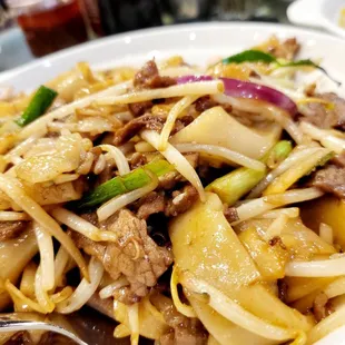 a plate of stir fried noodles