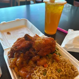 garlic curry chicken wings with fried rice and beef and broccoli with the thai tea with mango All Fair no foul