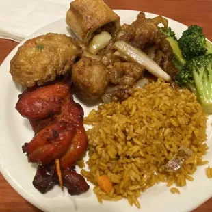 Fried Rice, teriyaki chicken, House roll, broccoli, and peppers chicken