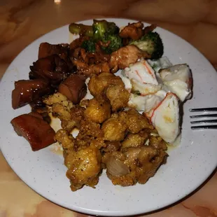 Starting At Noon:  Broccoli Chicken, Seafood Bake, Butter Chicken And Bourbon Chicken.   All Are Delicious!