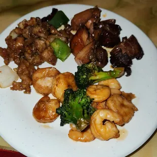 Front Clockwise:  Shrimp And Vegetables, Pepper Chicken and Bourbon Chicken.