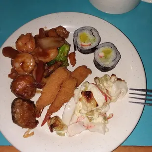 Clockwise:  Breaded Shrimp, Pork Filled Breaded Mushrooms, Shrimp and Vegetables, Philly Roll and Seafood Bake.
