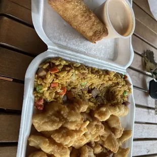 a tray of fried food and a cup of coffee