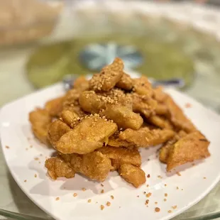 a plate of crispy fried shrimp