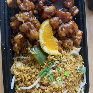 Overfried rice/orange chicken made with dark meat- inedible like eating chicken jerky