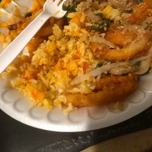 Plain fried rice, squid and very poorly tasted my point of you